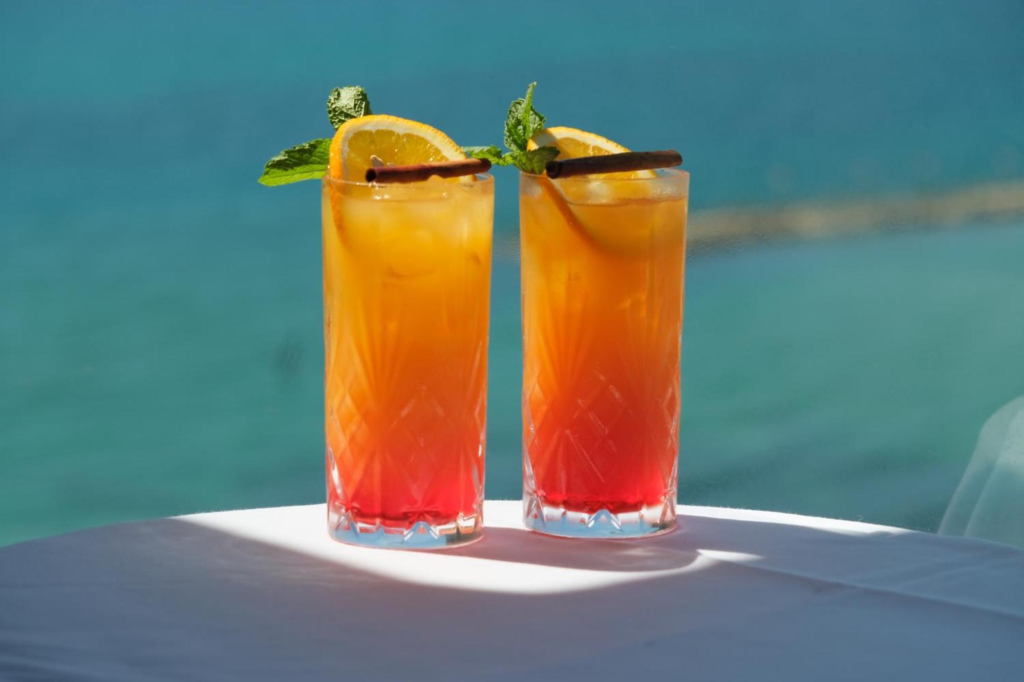 Carlton Tel Aviv Hotel - Luxury On The Beach Εξωτερικό φωτογραφία Two tequila sunrises